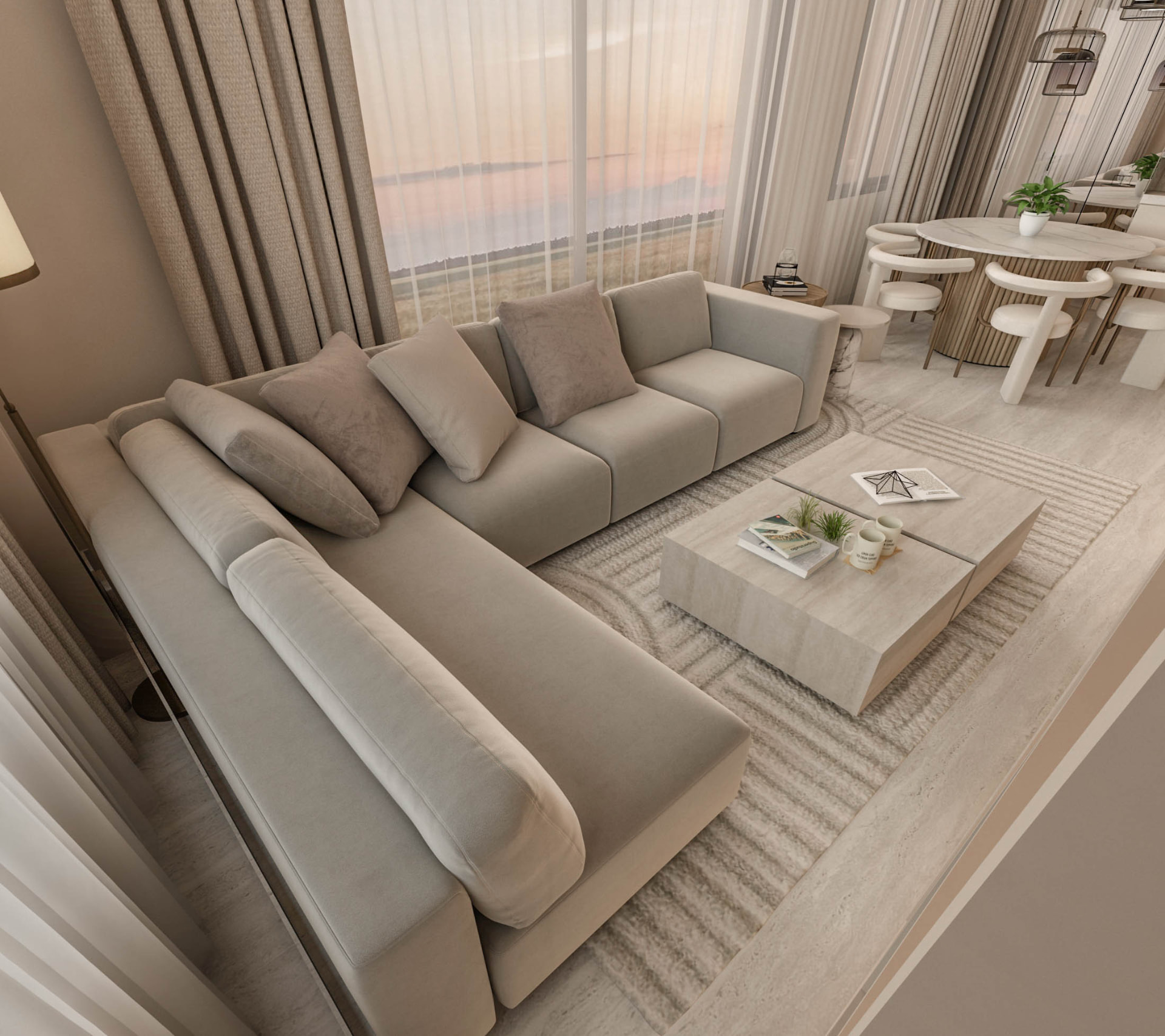 Overhead view of the modular sofa, travertine coffee table and dining setting
